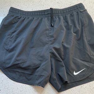 Nike Womens linerless run/athletic shorts in Charcoal. Size M